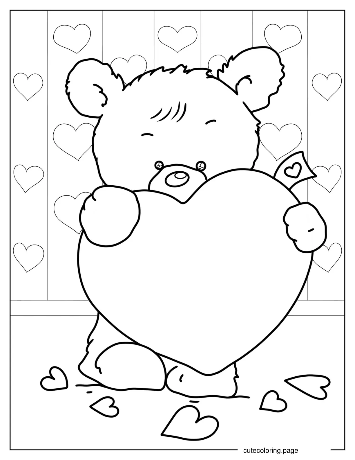 Baby Teddy Bear Holding a Love Heart coloring page